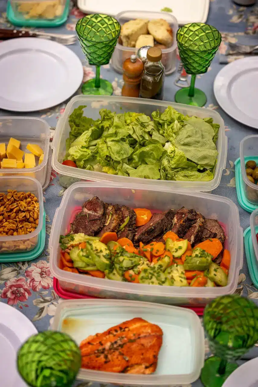 A colourful picnic with tupperwares of meat and vegetables from Tipiliuke Lodge in Patagonia